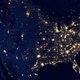 Illustration for article titled Heres a US map showing the constellation of city lights and highways